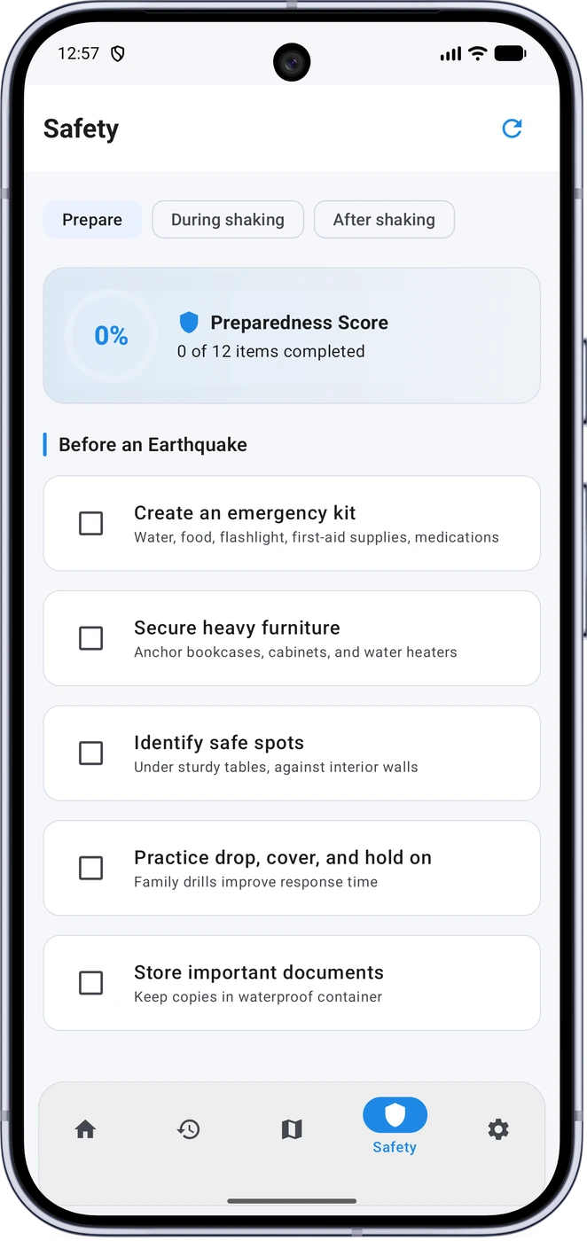 Phone screen showing QuakeSense preparedness checklist items and progress